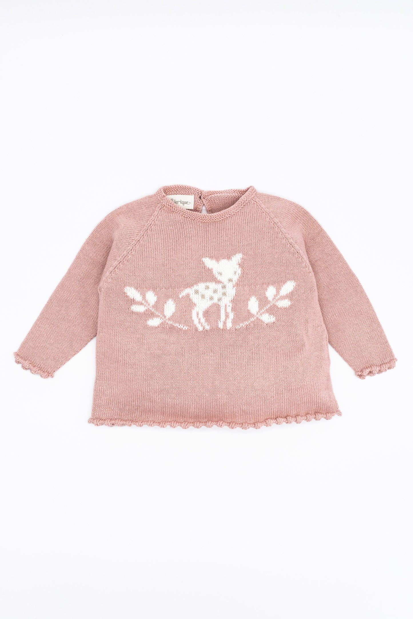Pink knitted sweater made of merino wool